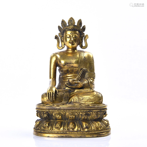 A GILT-BRONZE FIGURE OF SAKYAMUNI.QING PERIOD