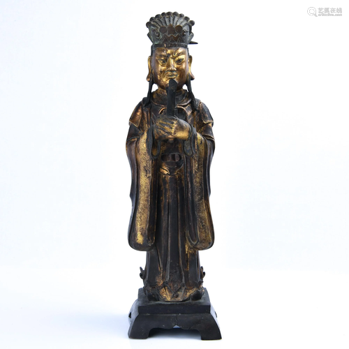 A GILT-BRONZE FIGURE OF OFFICER.MING PERIOD