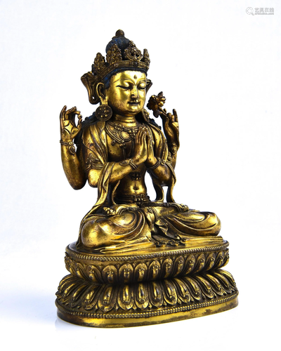 A GILT-BRONZE FIGURE OF GUANYIN.MING PERIOD