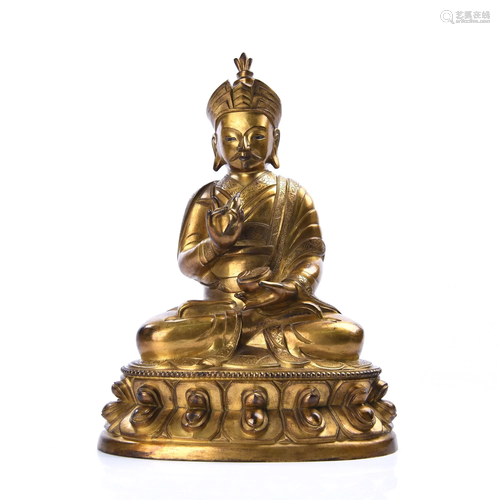 A GILT-BRONZE FIGURE OF PADMASAMBHAVA.QING …