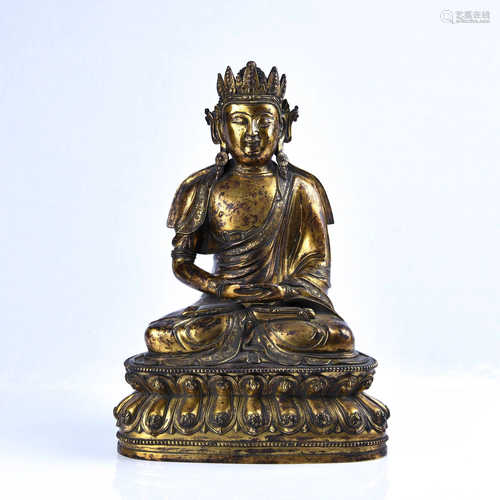 A GILT-BRONZE FIGURE OF SAKYAMUNI.QING PERIOD