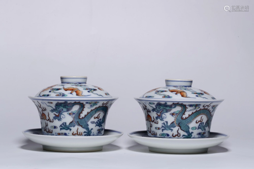 A PAIR OF DOUCAI 'DRAGON' CUP AND COVER.…