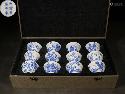 A SET OF TWELVE BLUE AND WHITE CUPS.MARK OF …