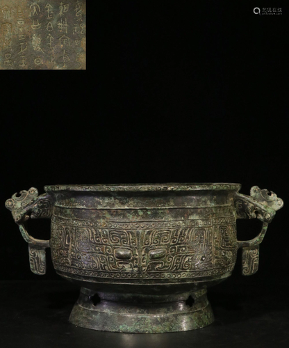 A BRONZE OOD VESSEL