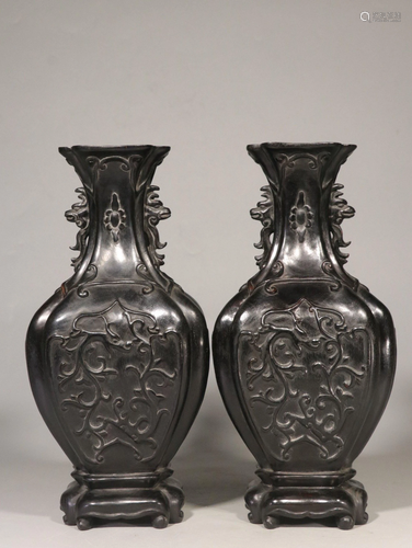 A PAIR OF CARVED ZITAN VASES.