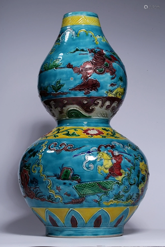 A FAHUA-GLAZED DOUBLE-GOURD VASE.MARK …