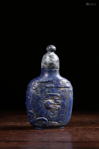 A CARVED LAPIS LAZULI SNUFF BOTTLE .QING PERIOD