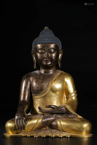 A GILT-BRONZE FIGURE OF SAKYAMUNI .QING PERIOD