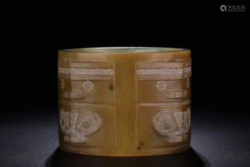 A CARVED JADE CONG.