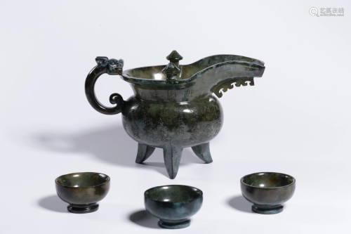 A CARVED SPINACH-JADE WINEPOT AND CUPS