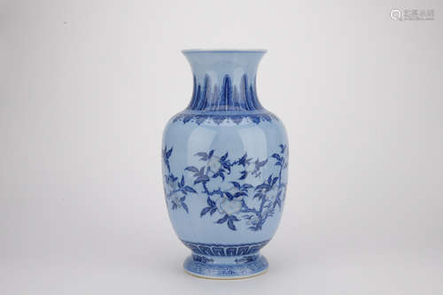 Qing dynasty blue glaze bottle with flowers pattern