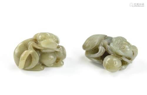 Two Chinese Carved Jade Foo-dog Figures