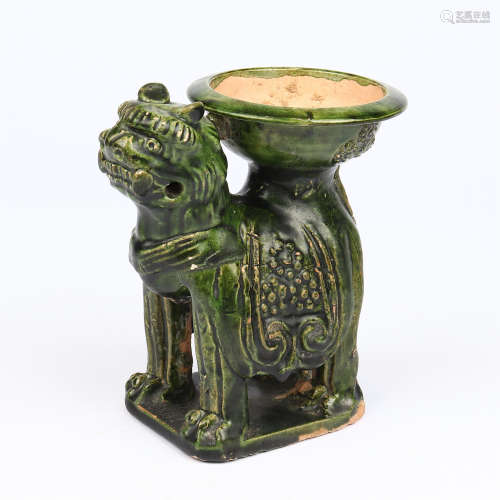 Green glazed lion lamp of Cizhou kiln in Song Dynasty