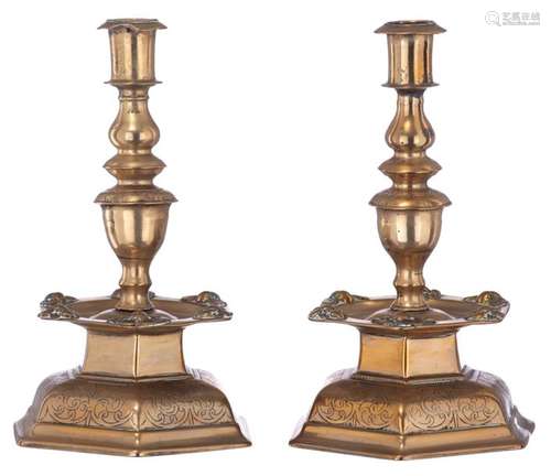 A pair of bronze Baroque candlesticks, with a hexa…