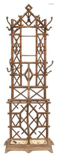 A cast iron bamboo imitation coat rack and umbrell…