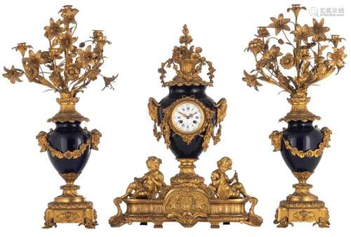 A gilt bronze three piece mantle clock garniture, …