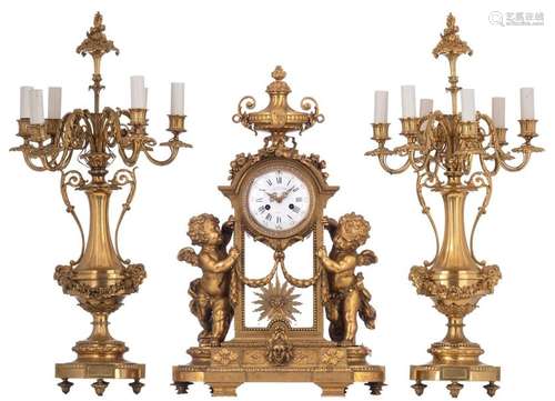 An imposing Neoclassical ormolu bronze three piece…