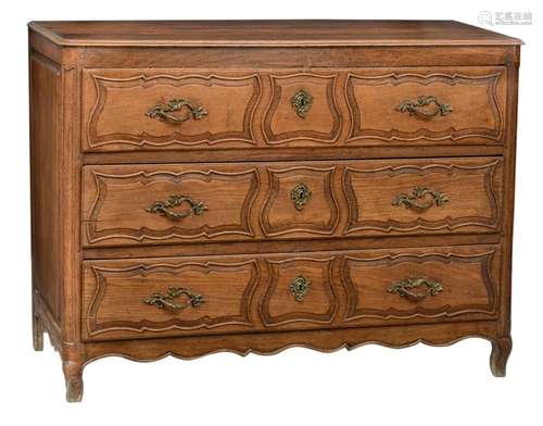 A provincial oak Rococo commode with brass mounts,…