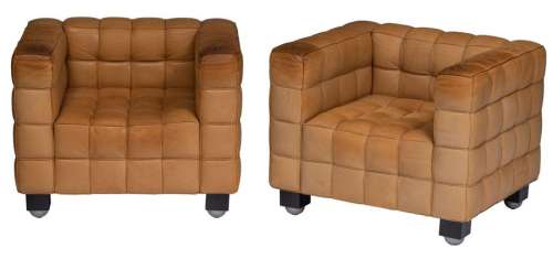 A pair of leather upholstered Kubus Armchairs, des…