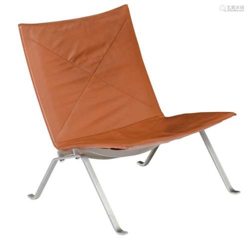A matt chromed aluminium and cognac leather uphols…