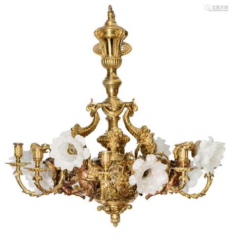 A gilt and patinated bronze chandelier, decorated …