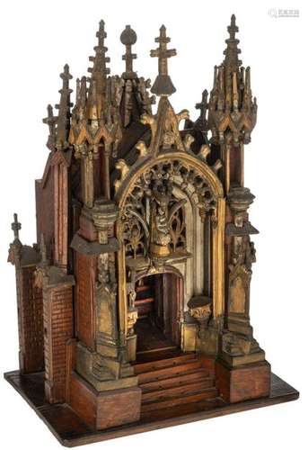 A rare gilt oak Gothic Revival shrine shaped like …