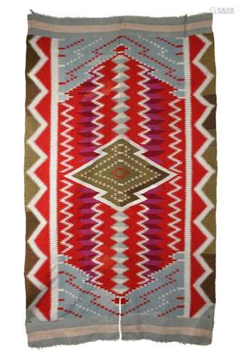 A Navajo Germantown rug. Southwest North America. …