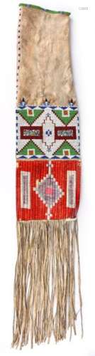 An Arapaho pipe bag. Plains. Buckskin, coloured gl…