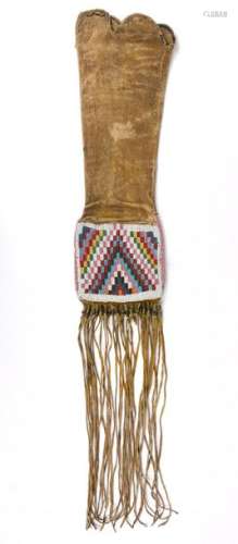An Ojibwa or Cree pipe bag. Plains. Buckskin with …