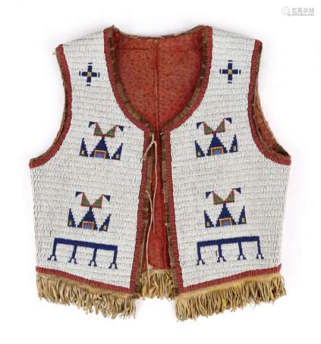 A Sioux boy~s fully beaded vest. South Dakota, pro…