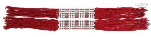 A pair of Ojibwa beaded dance garters. North East …