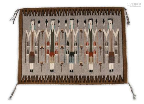 A Navajo Yei rug by Jessie Yazzie. Circa 1980. Woo…