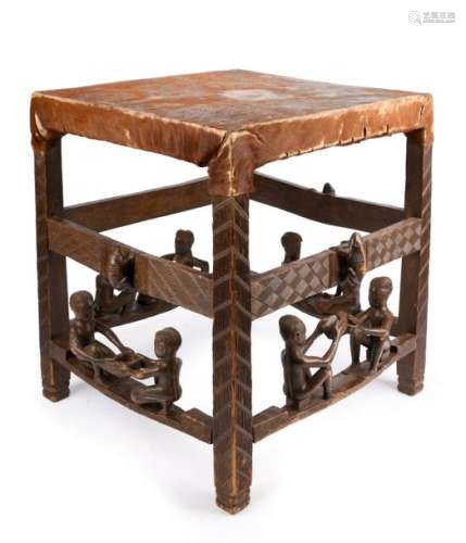 A Chokwe stool. Angola. Linear carved, the bottom …