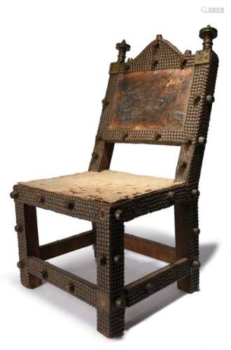 An Ashanti chair asipim. Ghana. Wood with embossed…