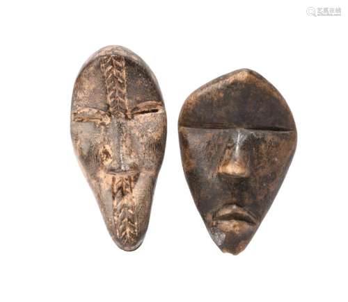 Two Dan passport masks. Ivory Coast. One with carv…