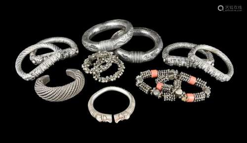 Two pairs of Omani bracelets. Silver coloured meta…