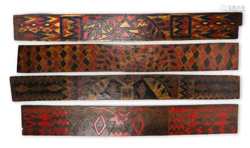 Four Ethiopian panels. With carved stylised, geome…