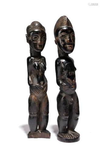 Two Baule standing figures. Ivory Coast. Male and …