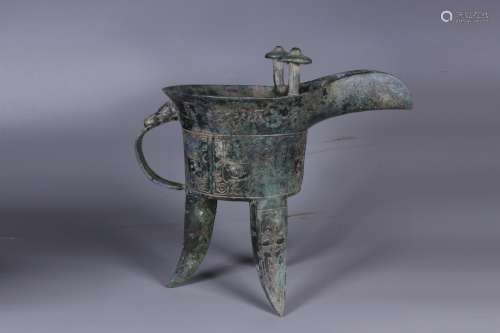 ARCHAIC BRONZE CAST TRIPOD RITUAL VESSEL