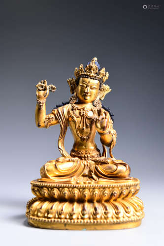 A CHINESE GILD COPPER DHARMAPALA STATUE