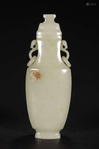 A CHINESE WHITE JADE CARVED RUYI EARS VASE