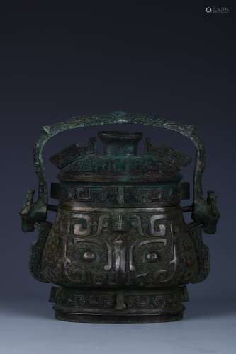 A CHINESE BRONZE LOOP&HANDLE POT