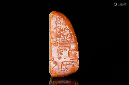 A CHINESE DRAGON CARVED JADE PENDANT