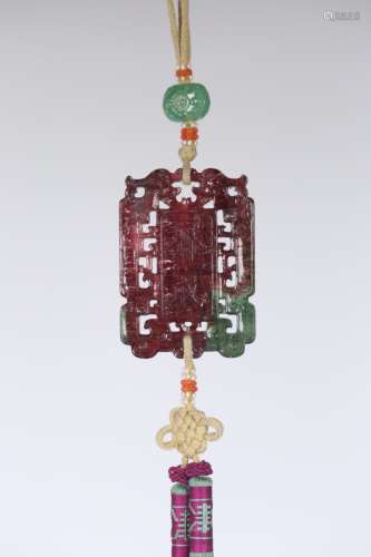 A CHINESE TOURMALINE CARVED PENDANT