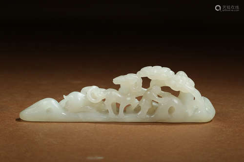 A CHINESE WHITE JADE CARVED ORNAMENT