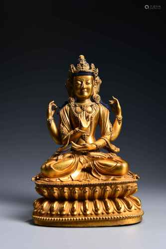 A CHINESE GILD COPPER 4 ARMS GUANYIN STATUE