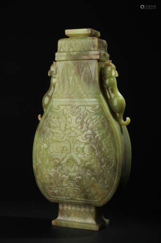 WHITE JADE CARVED 'TAOTIE MASK' FLATTENED VASE WITH LID