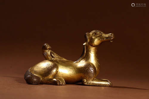 A CHINESE GILD COPPER DOG ORNAMENT