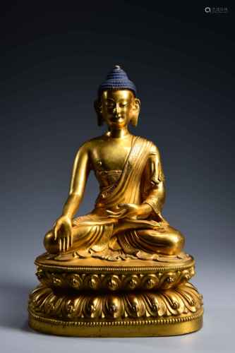 A CHINESE GILD COPPER SAKYAMUNI STATUE