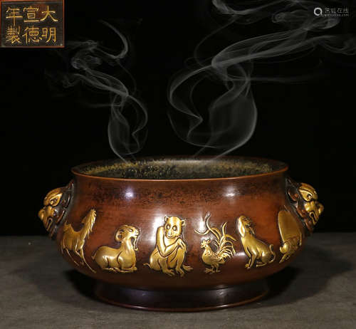 GILT BRONZE CAST 'ZODIAC' COMPRESSED CENSER WITH HANDLES